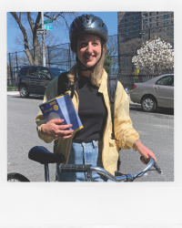 Person holding bike.